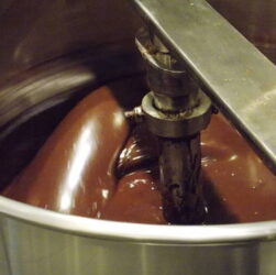 https://media.istockphoto.com/id/538777834/photo/liquid-chocolate-churning-in-machine.jpg?s=612x612&w=0&k=20&c=ItgjsHG2SwlStjYgUYdgABIdQPPqeC_EJ78JaUfAJG0=